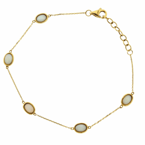 yellow gold bracelet with white opal bezel set
