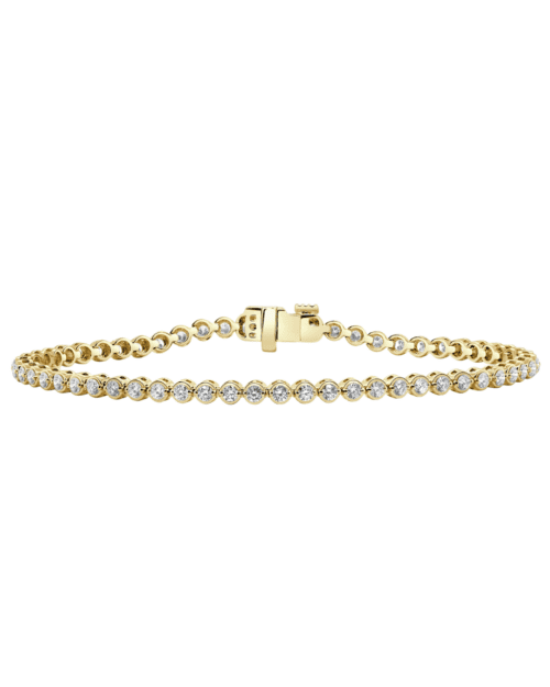 bezel and prong set diamond tennis bracelet in yellow gold