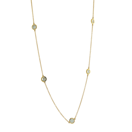 round lab grown diamonds on chain separated in yellow gold