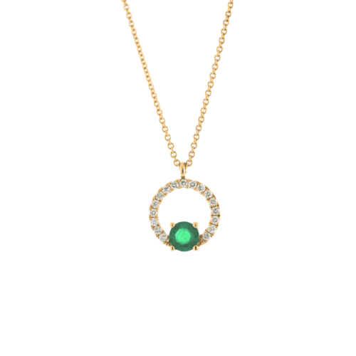 open circle of diamonds with small round green emerald on bottom in yellow gold on chain