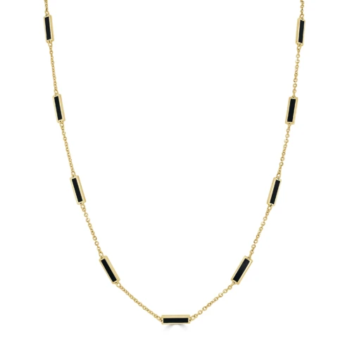 black onyx rectangle shapes on station necklace in yellow gold