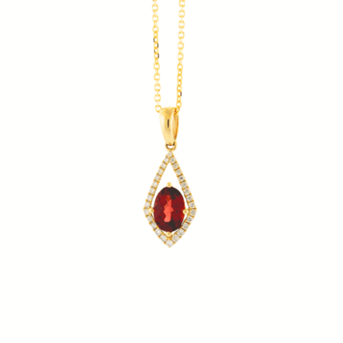 yellow gold pendant with oval shape garnet and diamond detailing on yellow chain