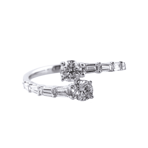two round diamonds stacked and next to baguette shaped diamonds in white gold