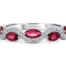 marquise shaped rubies with a wave of diamonds in white gold
