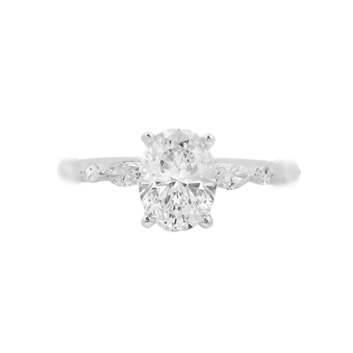 white gold shared prong engagement ring with one marquise and one round on either side of center stone