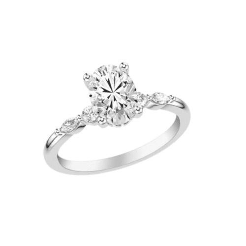 white gold shared prong engagement ring with one marquise and one round on either side of center stone