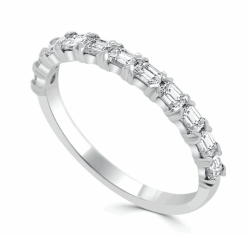 white gold straight row band with long baguette diamonds prong set
