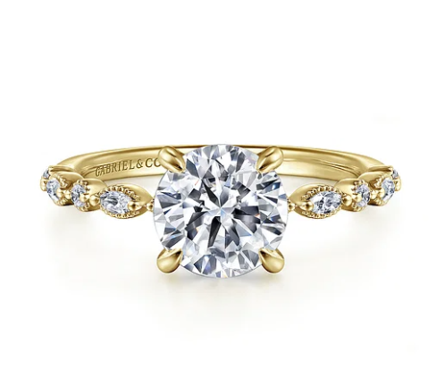 yellow gold diamond engagement ring with alternating side diamonds marquise and round shapes
