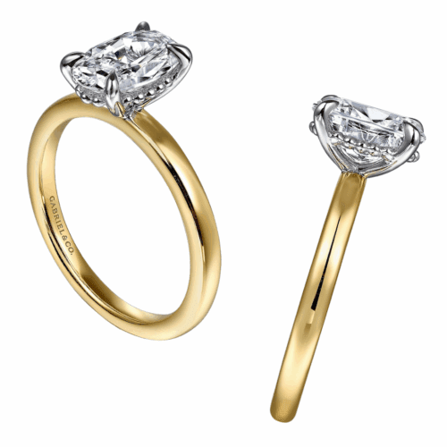 yellow gold diamond engagement ring with a small beaded hidden halo, oval head