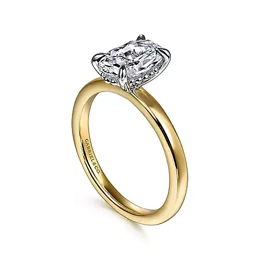 yellow gold diamond engagement ring with a small beaded hidden halo, oval head