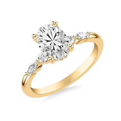 yellow gold diamond engagement ring with one marquise and round shape diamond on either side of the center stone