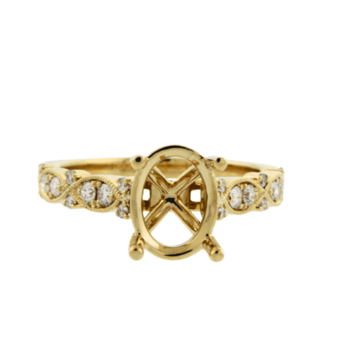 alternating pattern with milgrain design yellow gold diamond engagement ring with oval shape head