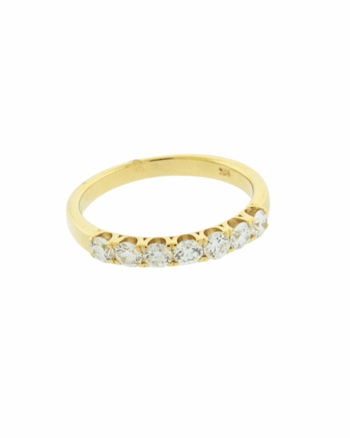 7 stone yellow gold prong set wedding band
