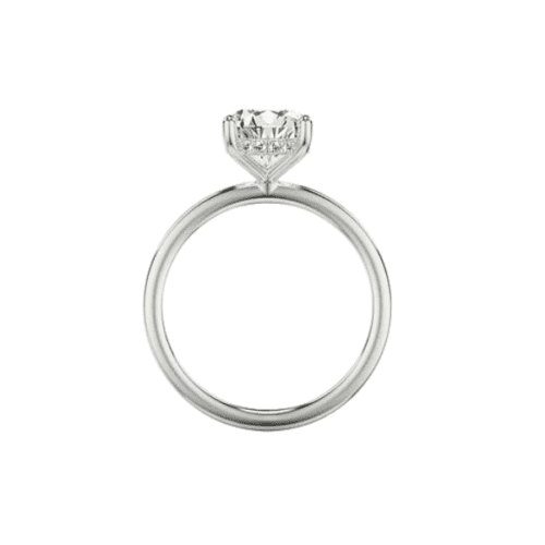 white gold diamond engagement ring with hidden halo of diamonds and emerald head