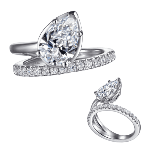 pear shape head engagement ring, with straight row of diamonds and half solitaire