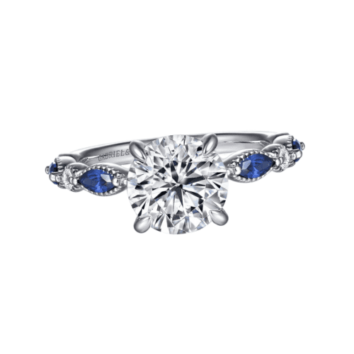 white gold engagement ring with round center, alternating pattern sapphires and diamonds
